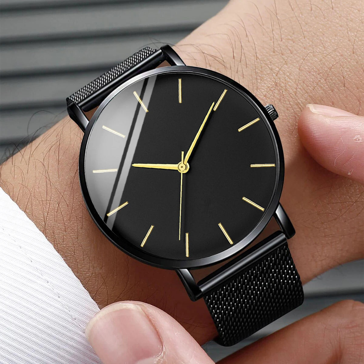 Fashion Men Business Watch is a stylish and ultra-thin quartz watch designed for modern men. Featuring a premium stainless steel mesh belt, it offers a perfect combination of elegance, comfort, and durability for business or