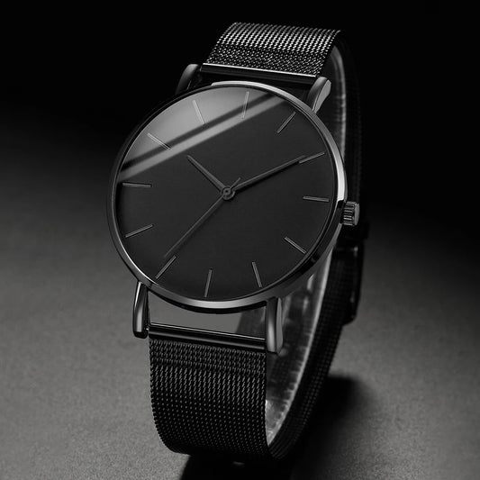 Fashion Men Business Watch is a stylish and ultra-thin quartz watch designed for modern men. Featuring a premium stainless steel mesh belt, it offers a perfect combination of elegance, comfort, and durability for business or