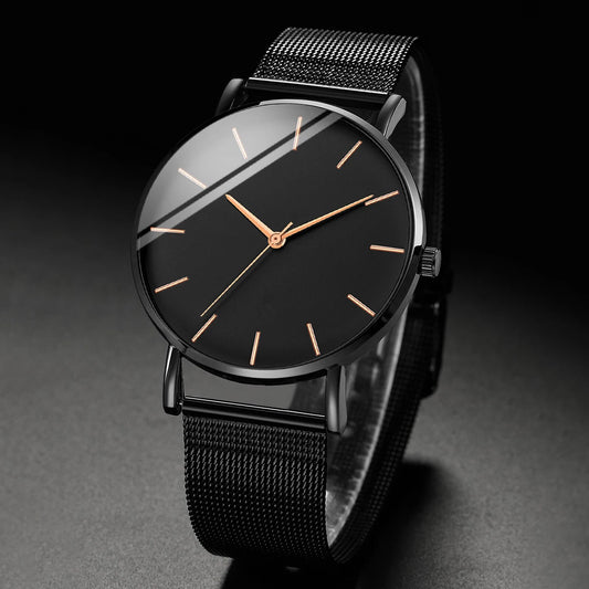 Fashion Men Business Watch is a stylish and ultra-thin quartz watch designed for modern men. Featuring a premium stainless steel mesh belt, it offers a perfect combination of elegance, comfort, and durability for business or