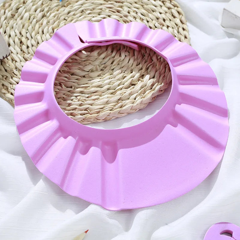 Baby Shower Soft Cap is designed to protect kids’ eyes and ears during hair washing and bathing. Soft, adjustable, and comfortable design helps make shampoo time safer and more enjoyable for children.