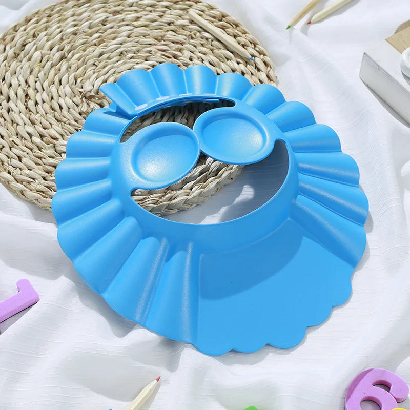 Baby Shower Soft Cap is designed to protect kids’ eyes and ears during hair washing and bathing. Soft, adjustable, and comfortable design helps make shampoo time safer and more enjoyable for children.