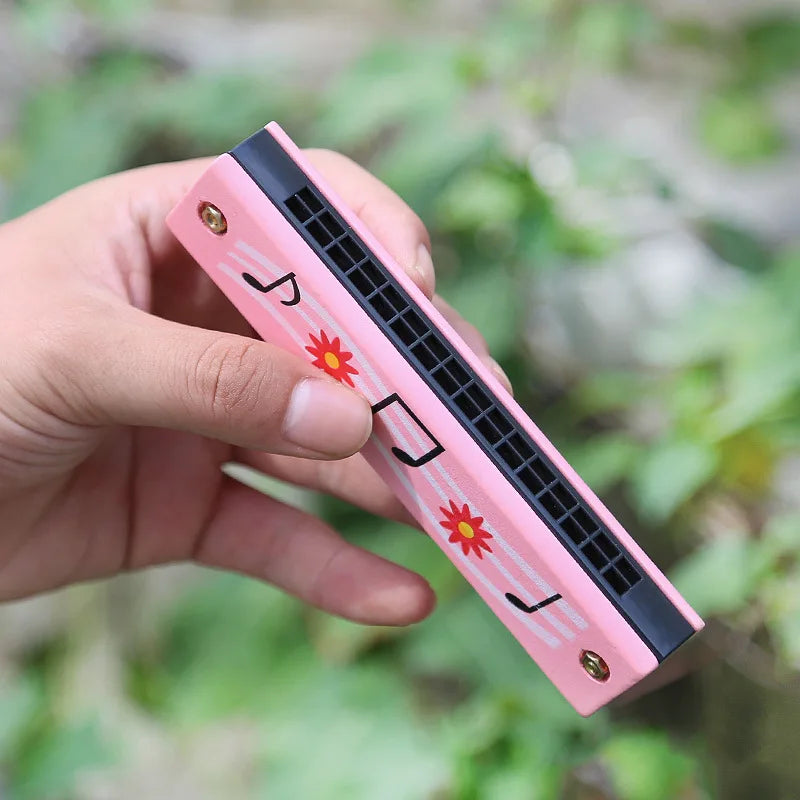 16-Hole Wooden Harmonica is a cute cartoon animal musical toy for kids. It helps improve creativity and early learning while making music fun for children.