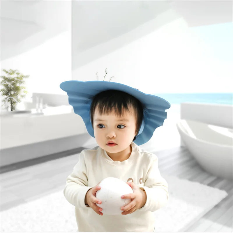 Baby Shower Soft Cap is designed to protect kids’ eyes and ears during hair washing and bathing. Soft, adjustable, and comfortable design helps make shampoo time safer and more enjoyable for children.