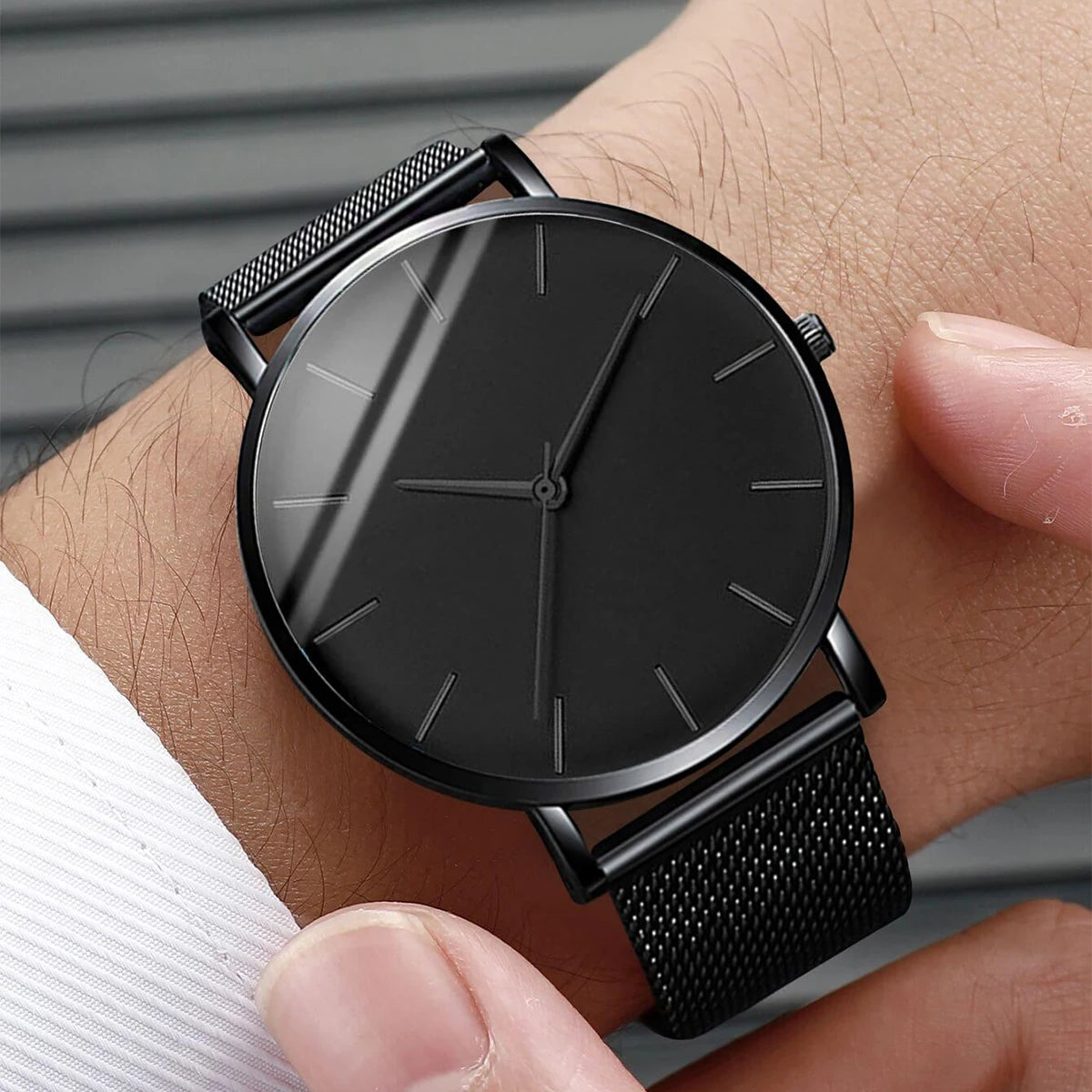 Fashion Men Business Watch is a stylish and ultra-thin quartz watch designed for modern men. Featuring a premium stainless steel mesh belt, it offers a perfect combination of elegance, comfort, and durability for business or