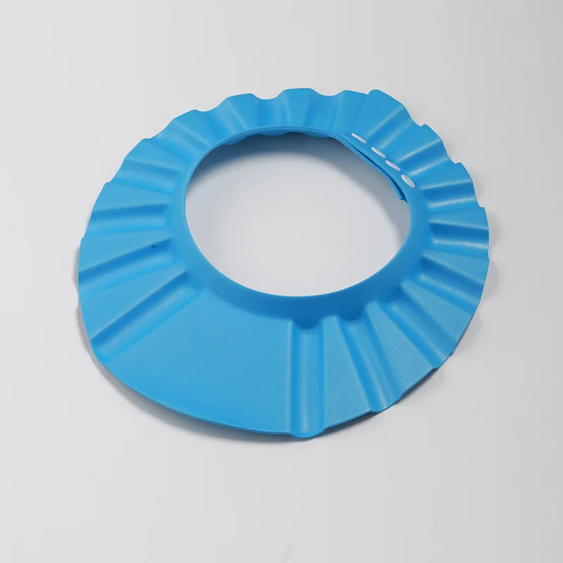Baby Shower Soft Cap is designed to protect kids’ eyes and ears during hair washing and bathing. Soft, adjustable, and comfortable design helps make shampoo time safer and more enjoyable for children.