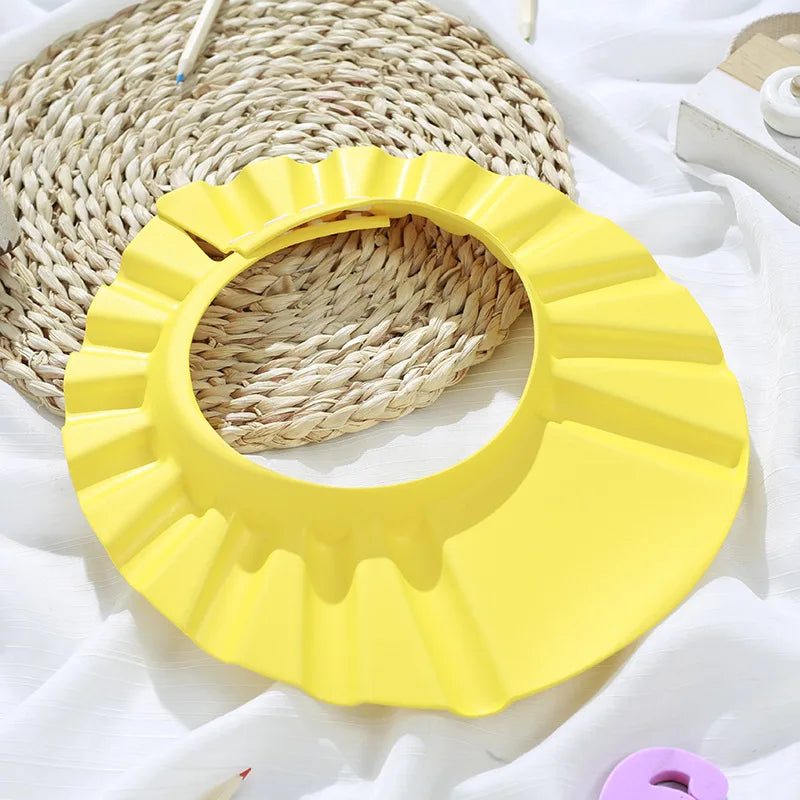 Baby Shower Soft Cap is designed to protect kids’ eyes and ears during hair washing and bathing. Soft, adjustable, and comfortable design helps make shampoo time safer and more enjoyable for children.