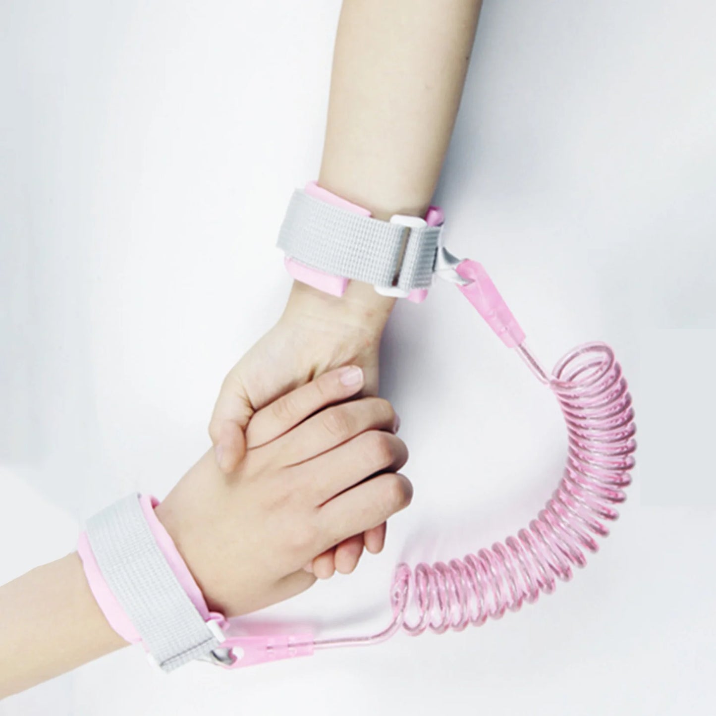 Child Safety Harness Leash helps keep toddlers and kids safe in crowded places. Adjustable wristband and traction rope design provides comfort, security, and anti-lost protection during travel, shopping, and outdoor activitie